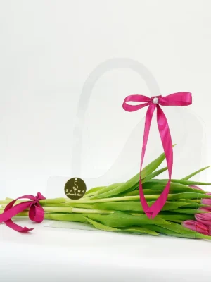 Hot Pink Tulip Bag in a clear acrylic handbag with satin magenta ribbons