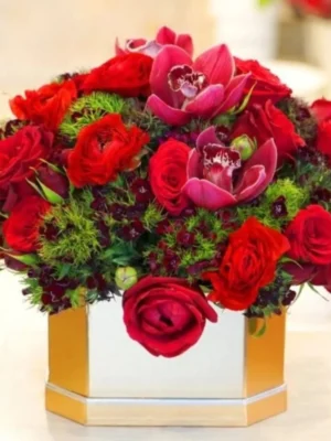 Orchid Secret Bouquet with red roses and orchids in a golden box arrangement