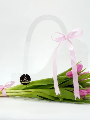Pink Tulip Bag arrangement with fresh tulips in a transparent acrylic handbag