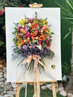 Salma Portrait floral arrangement with colorful roses, lilies, orchids, and seasonal blooms