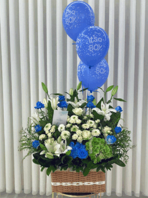 Baby boy flower basket with white lilies, blue roses, chrysanthemums, and green hydrangea