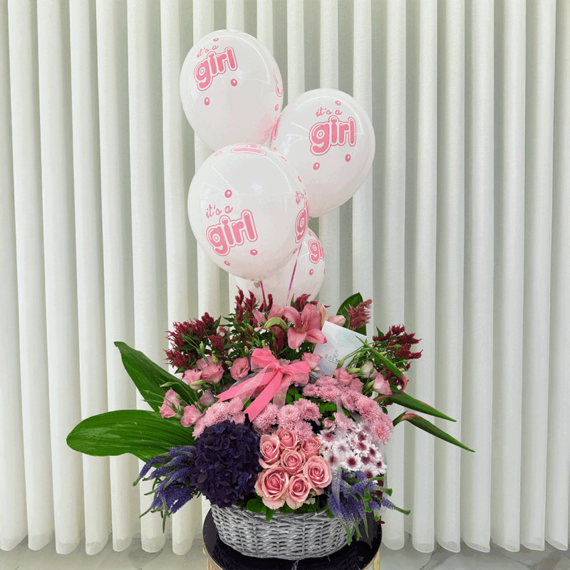 Baby girl flower basket with hydrangea, roses, and chrysanthemums