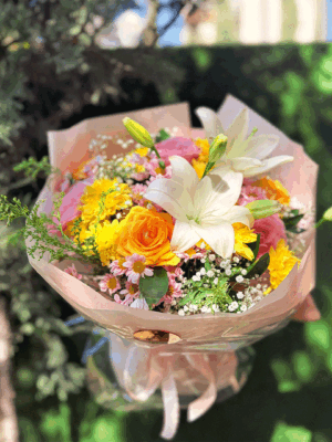 Hand bouquet with white lilies, roses, gerbera & small chrysanthemums