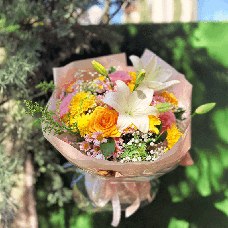Hand bouquet with white lilies, roses, gerbera & small chrysanthemums