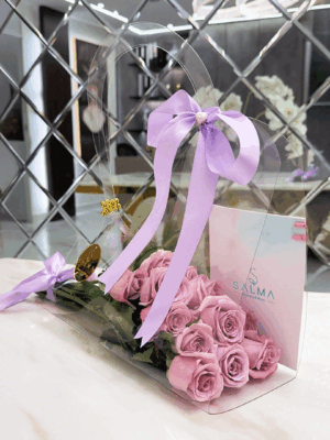 Luxury lavender rose bag arrangement in acrylic packaging