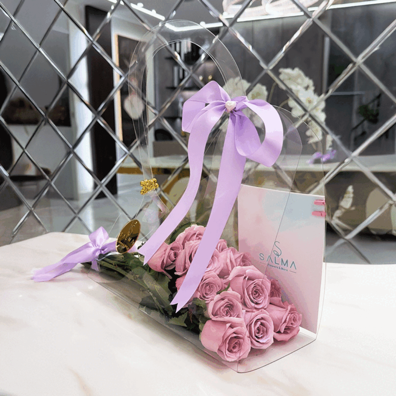 Luxury lavender rose bag arrangement in acrylic packaging
