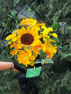 Bright sunflower bouquet with yellow chrysanthemums and gerbera