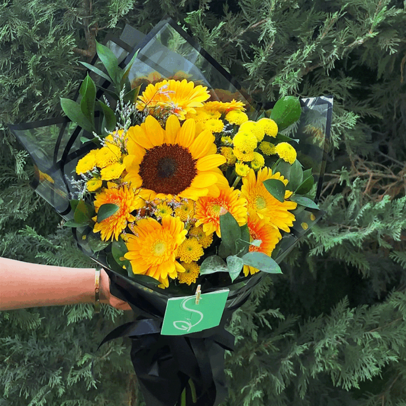 Bright sunflower bouquet with yellow chrysanthemums and gerbera