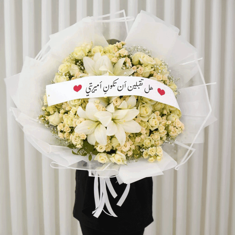 Luxury white lily and rose bouquet with baby roses