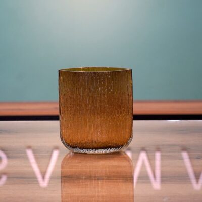 Dark ribbed glass vase for luxury flower bouquets in Amman.